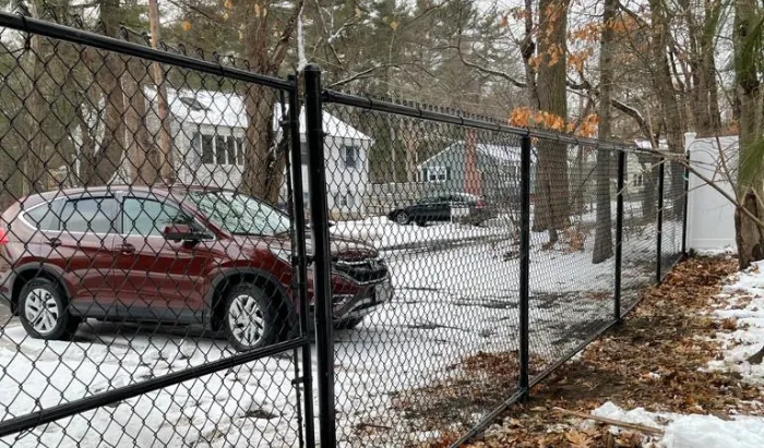 New fence installed in a residential property in Billerica Massachusetts