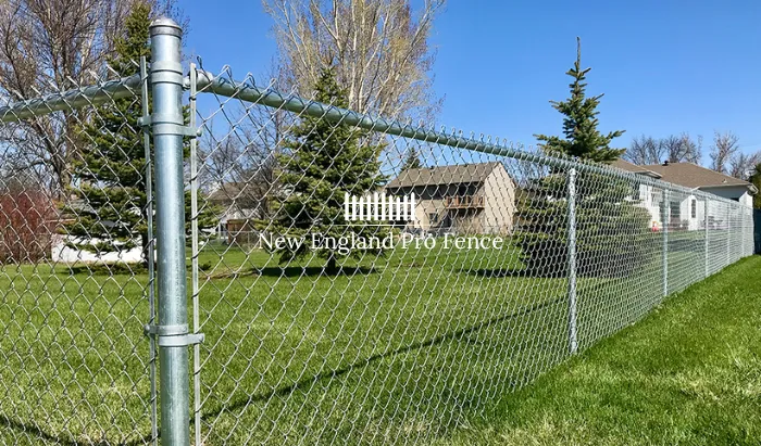 The most affordable fencing option for Massachusetts homeowners. Galvanized chain link fencing provides security and boundary definition at the lowest cost per foot. Available in 4-foot, 5-foot, and 6-foot heights. Perfect for backyards, pet containment, and property boundaries.