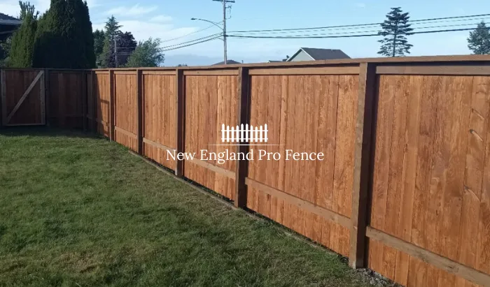 Classic cedar and pressure-treated wood privacy fences with natural beauty and warmth. Available in board-on-board, solid board, and shadowbox styles. Can be stained or painted any color. The most customizable privacy fence option for Massachusetts homes.