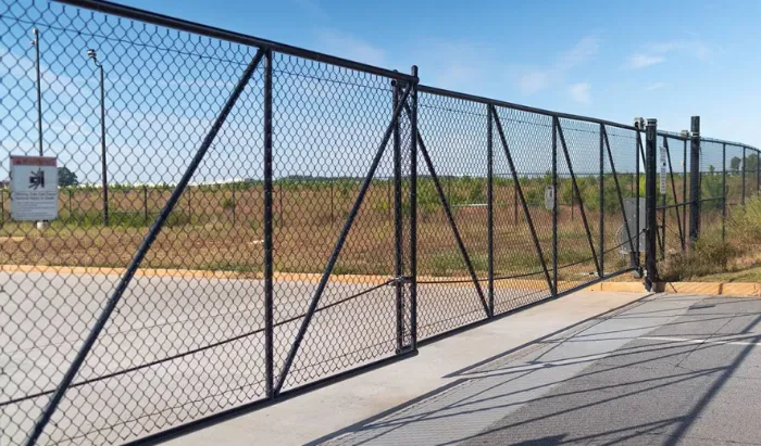 High-security commercial fencing for warehouses, storage facilities, data centers, and industrial sites. Heavy-gauge chain link, anti-climb designs, and barbed wire or razor wire options. Keeps unauthorized access out and your assets protected 24/7.