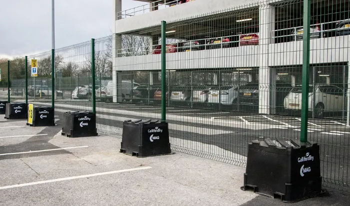 Perimeter fencing for commercial parking lots, garages, and vehicle storage areas. Controls access, prevents unauthorized parking, and improves security. Available in chain link, aluminum, and steel options with automated gate systems.
