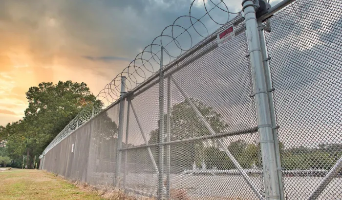 Heavy-duty industrial fencing for manufacturing plants, distribution centers, and utility installations. Maximum security construction with anti-cut, anti-climb features. Designed to withstand heavy equipment, vehicle impact, and extreme weather.