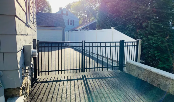 Backyard fence installation by New England Pro Fence serving homeowners across Massachusetts and New Hampshire
