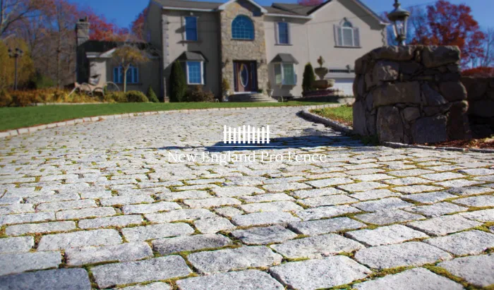 Old-world European style. Tumbled cobblestone pavers create a rustic, textured surface perfect for New England estates and historic homes. Extremely durable — many original cobblestone streets in Massachusetts are still in use after 100+ years. A true statement driveway.
