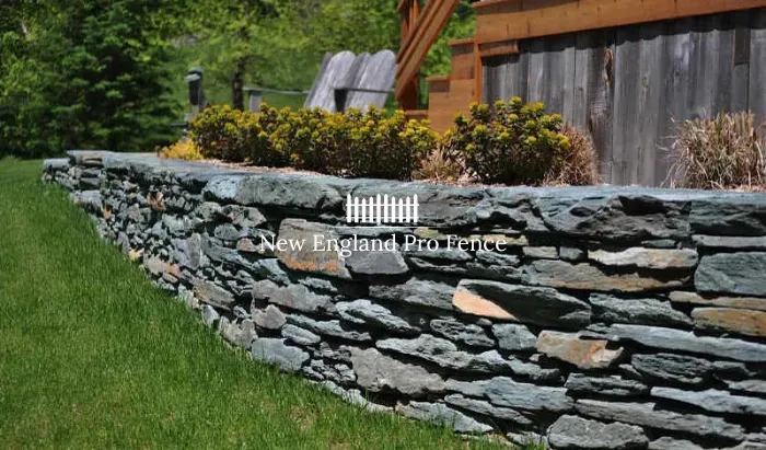 Traditional construction method using no mortar. Stones are carefully selected, fitted, and stacked using gravity, friction, and centuries-old technique. Allows natural drainage through the wall — eliminating the hydrostatic pressure that destroys mortared walls over time. Develops beautiful character as lichens and mosses colonize the stones. The most traditional and ecologically sound New England method.